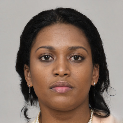 Neutral black young-adult female with long  black hair and brown eyes