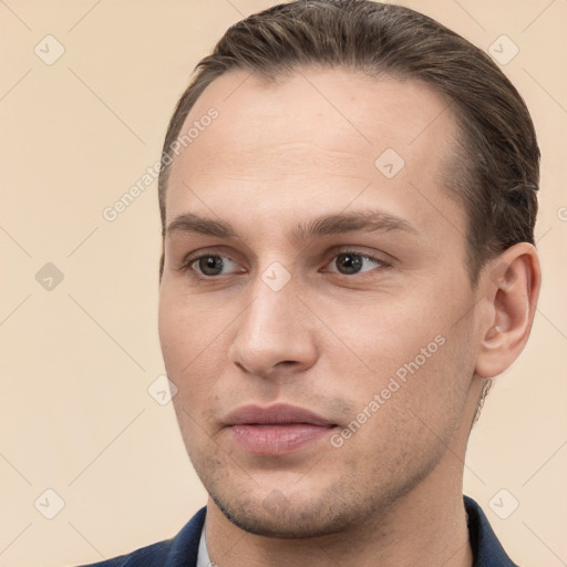 Neutral white young-adult male with short  brown hair and brown eyes