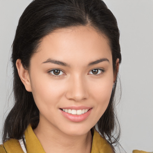 Joyful white young-adult female with medium  brown hair and brown eyes