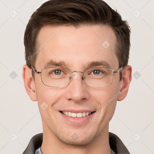 Joyful white adult male with short  brown hair and grey eyes