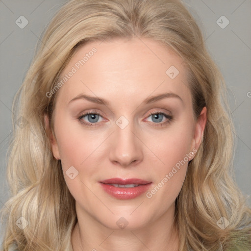 Joyful white young-adult female with long  brown hair and blue eyes