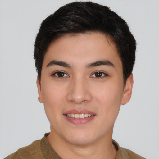 Joyful asian young-adult male with short  brown hair and brown eyes