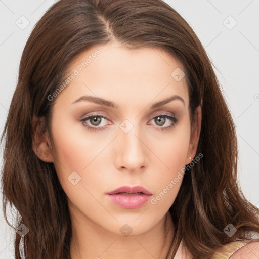 Neutral white young-adult female with long  brown hair and brown eyes