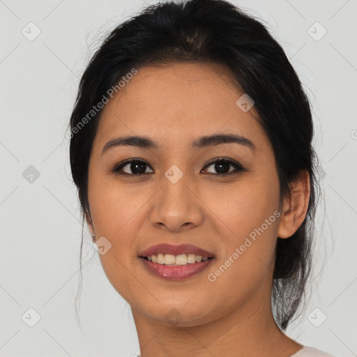 Joyful asian young-adult female with medium  black hair and brown eyes