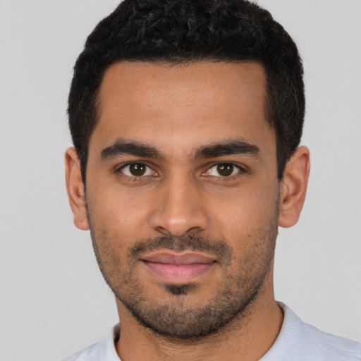 Neutral latino young-adult male with short  black hair and brown eyes