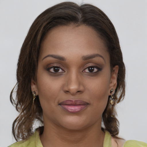 Joyful white young-adult female with medium  brown hair and brown eyes