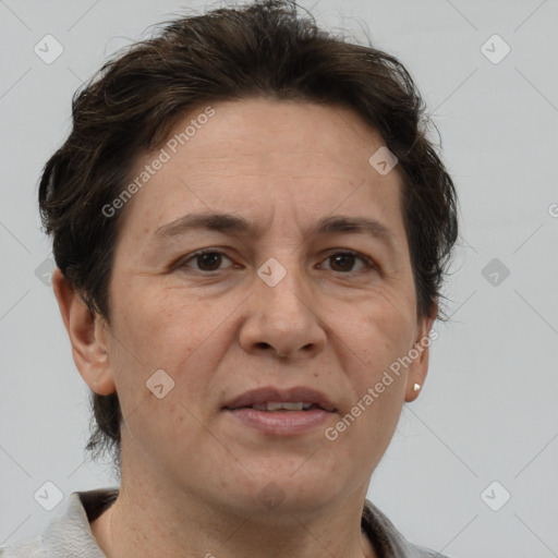 Joyful white adult female with short  brown hair and brown eyes