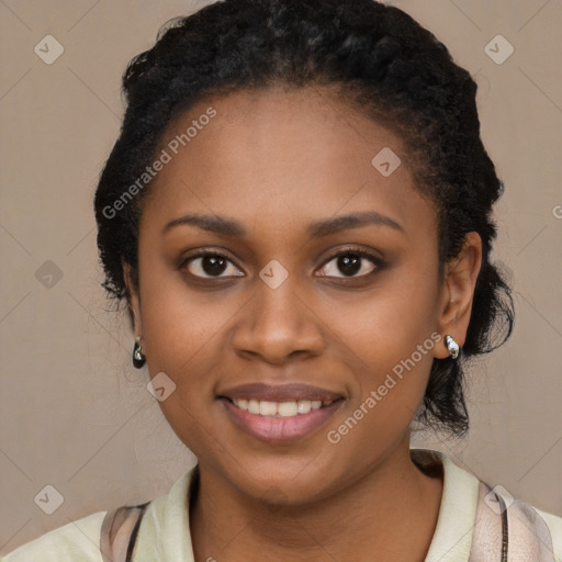 Joyful black young-adult female with medium  black hair and brown eyes