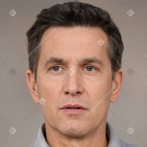 Neutral white adult male with short  brown hair and brown eyes