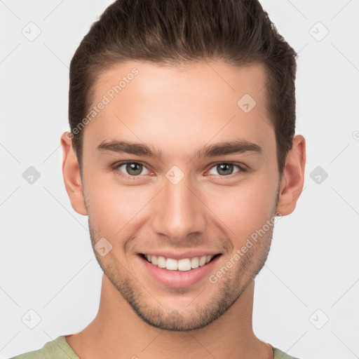 Joyful white young-adult male with short  brown hair and brown eyes