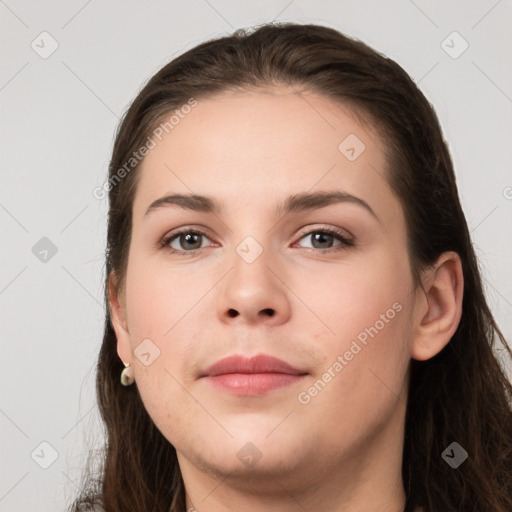 Neutral white young-adult female with long  brown hair and grey eyes