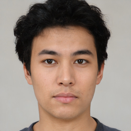 Neutral asian young-adult male with short  black hair and brown eyes