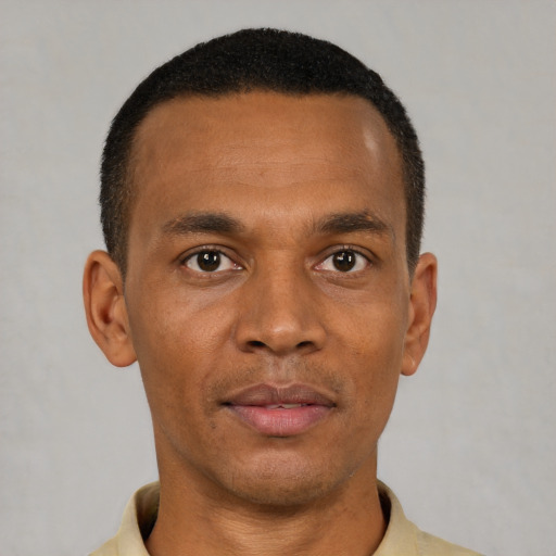 Neutral black young-adult male with short  black hair and brown eyes
