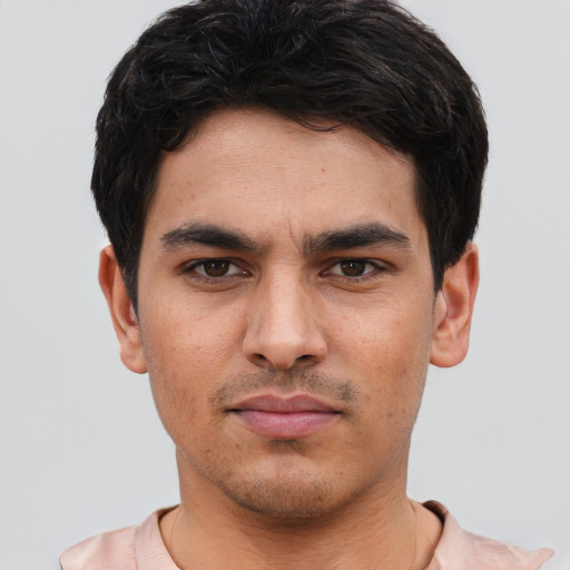 Neutral white young-adult male with short  black hair and brown eyes