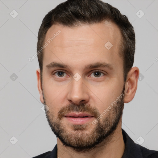 Neutral white young-adult male with short  brown hair and brown eyes