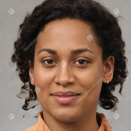 Joyful latino adult female with medium  brown hair and brown eyes