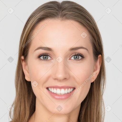 Joyful white young-adult female with long  brown hair and grey eyes