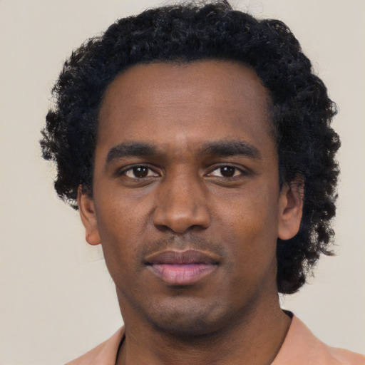 Neutral black young-adult male with short  black hair and brown eyes