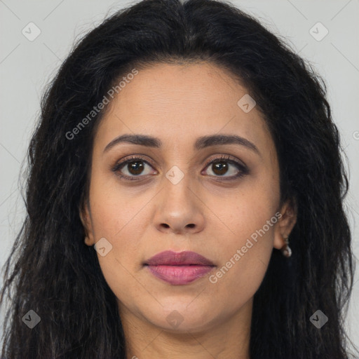 Joyful latino young-adult female with long  brown hair and brown eyes