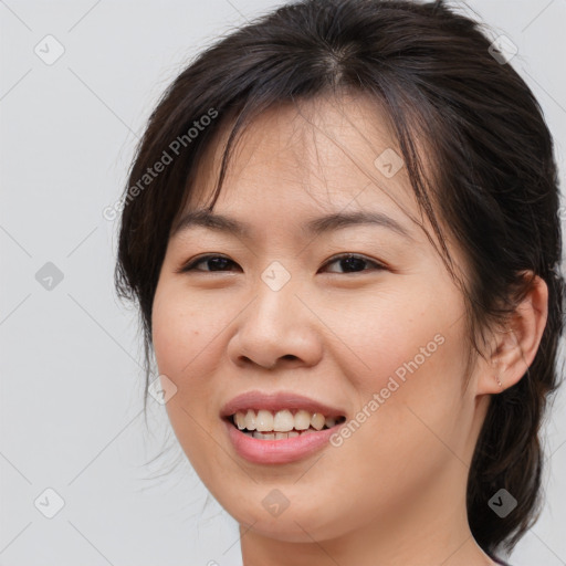 Joyful white young-adult female with medium  brown hair and brown eyes