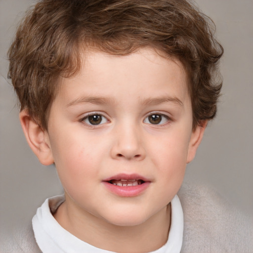 Joyful white child male with short  brown hair and brown eyes