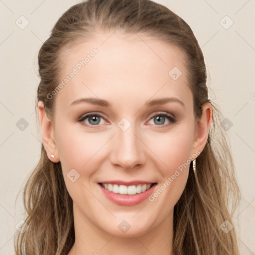 Joyful white young-adult female with long  brown hair and blue eyes