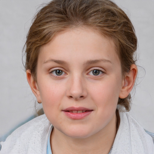 Joyful white child female with medium  brown hair and blue eyes