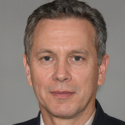 Neutral white middle-aged male with short  brown hair and brown eyes