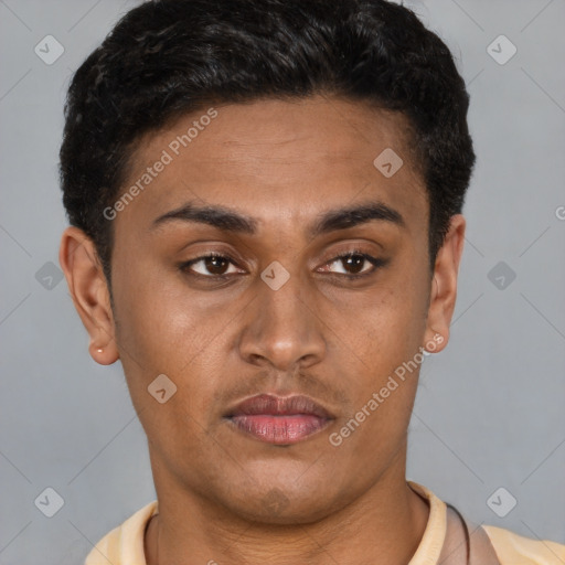 Joyful latino young-adult male with short  brown hair and brown eyes
