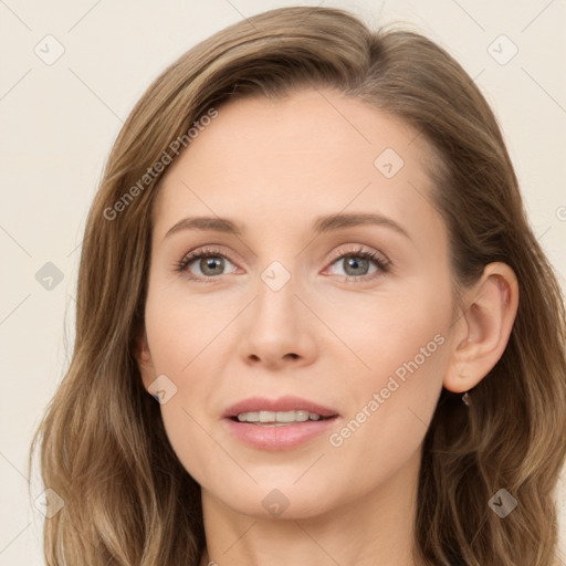 Joyful white young-adult female with long  brown hair and green eyes