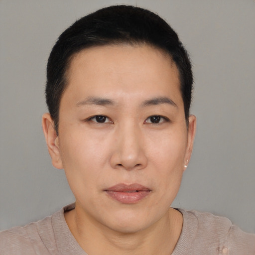Neutral asian young-adult male with short  black hair and brown eyes
