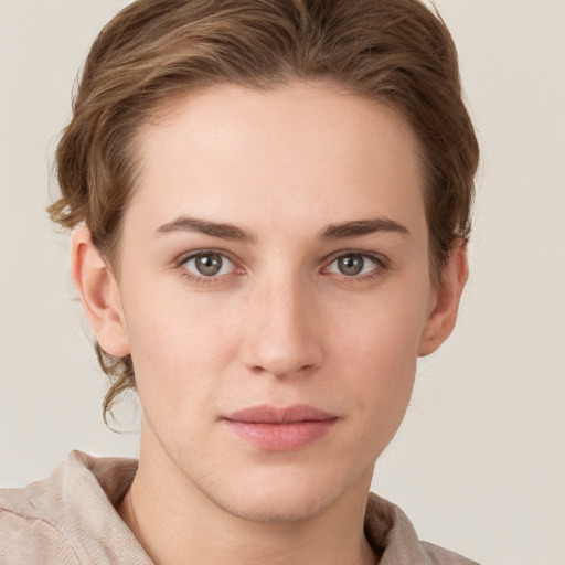 Neutral white young-adult female with short  brown hair and grey eyes