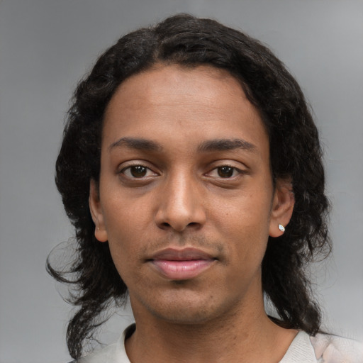 Neutral black young-adult male with medium  black hair and brown eyes