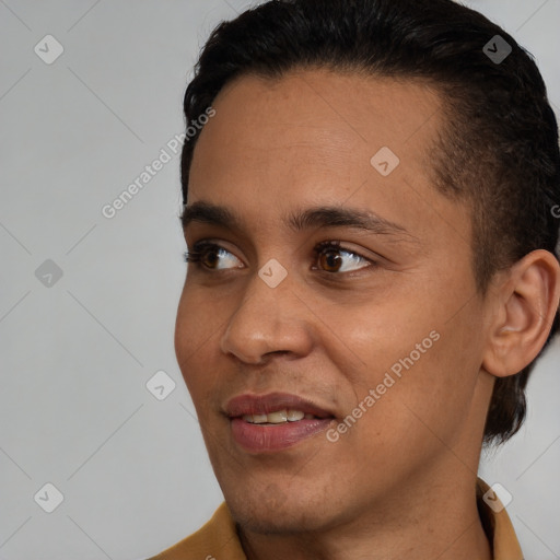 Joyful black young-adult male with short  brown hair and brown eyes