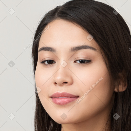 Joyful white young-adult female with long  black hair and brown eyes