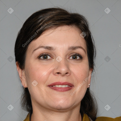 Joyful white adult female with medium  brown hair and brown eyes