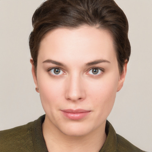 Neutral white young-adult female with short  brown hair and brown eyes