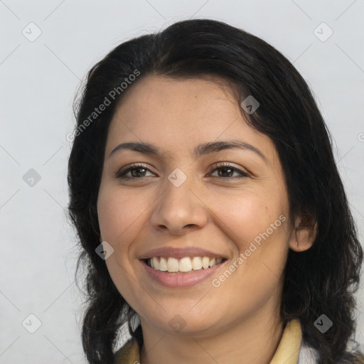 Joyful latino young-adult female with long  brown hair and brown eyes