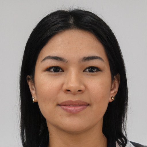 Joyful asian young-adult female with medium  black hair and brown eyes