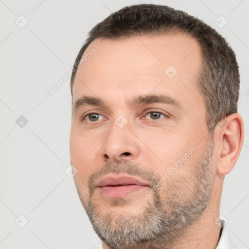 Neutral white adult male with short  brown hair and brown eyes