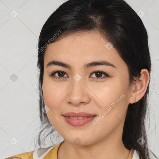 Joyful asian young-adult female with medium  brown hair and brown eyes