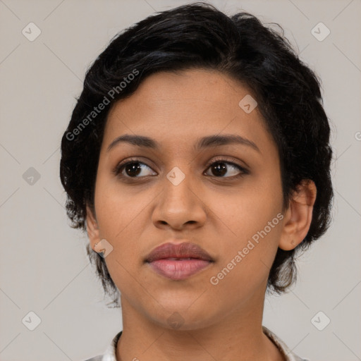 Joyful latino young-adult female with medium  black hair and brown eyes