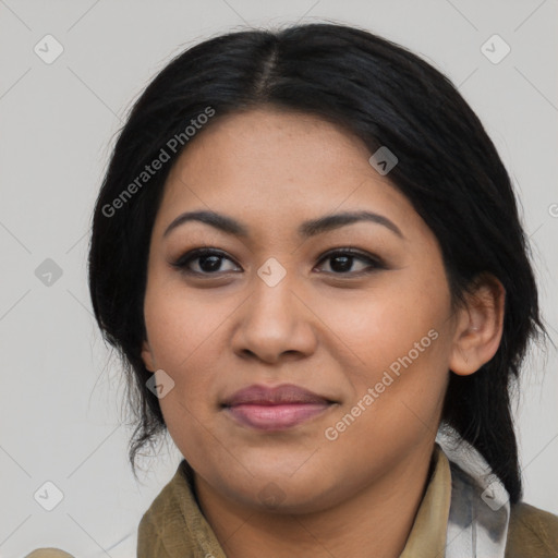 Joyful latino young-adult female with medium  black hair and brown eyes