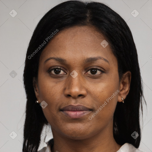 Joyful black young-adult female with medium  black hair and brown eyes