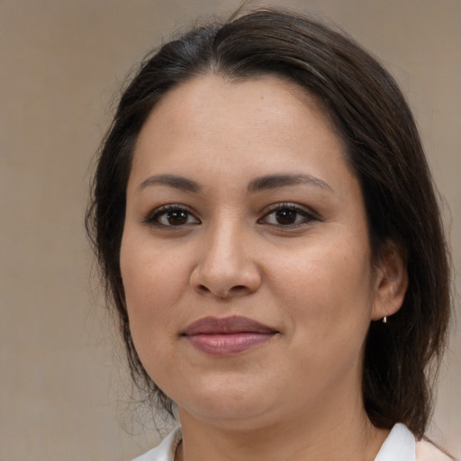 Joyful white young-adult female with medium  brown hair and brown eyes