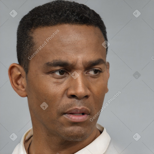 Neutral black young-adult male with short  black hair and brown eyes