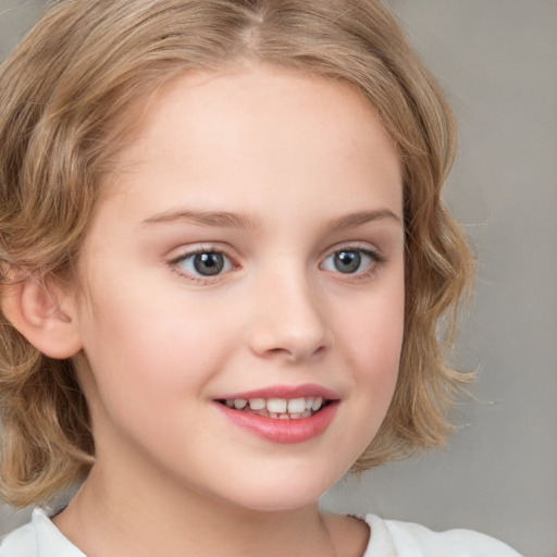 Joyful white child female with medium  brown hair and blue eyes