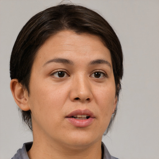 Neutral white young-adult female with medium  brown hair and brown eyes