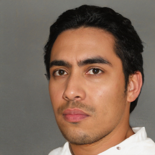 Neutral latino young-adult male with short  black hair and brown eyes