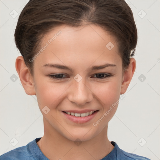 Joyful white child female with short  brown hair and brown eyes